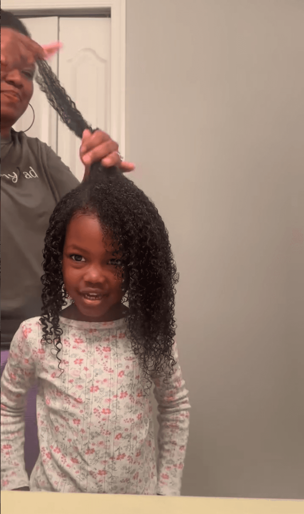 Confident woman with natural curly hair